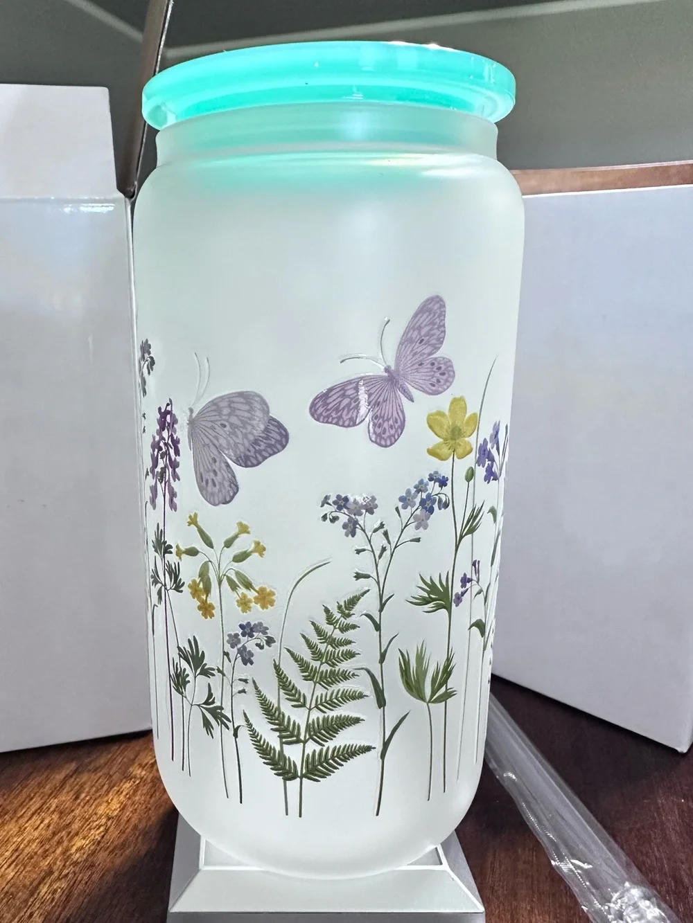 Glass tumbler with a butterfly and wildflower design – Mint green accents